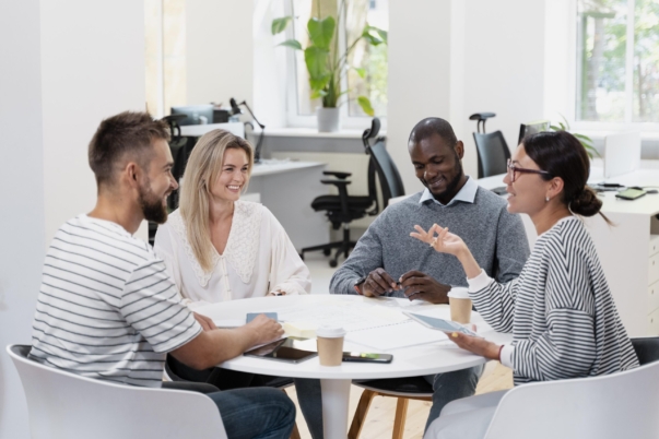 close-up-young-colleagues-having-meeting